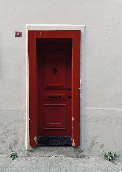 Modern red door entry with minimalist architecture