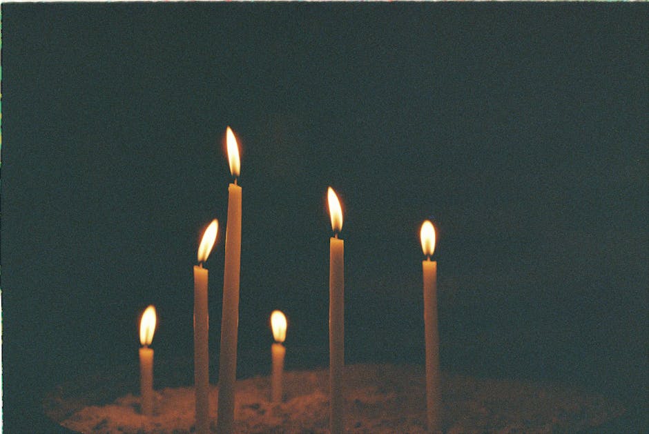 Burning candles providing ambient indoor lighting